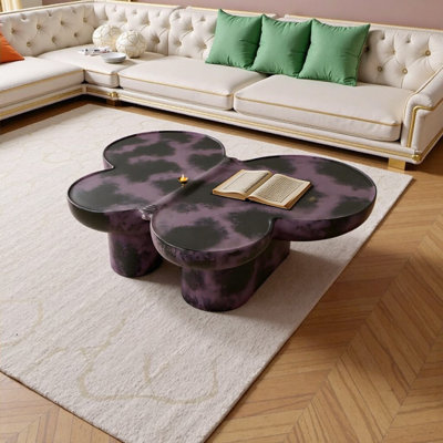 Table basse incurvée moderne en faux travertin noir pour salon