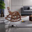 Belle et unique chaise berçante en rotin