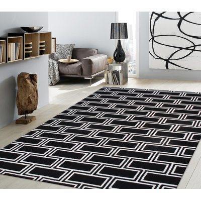 Tapis noir en soie et laine touffetés à la main