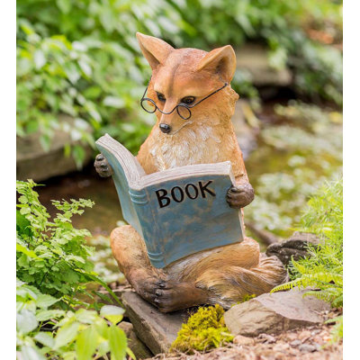 Statue de renard lisant