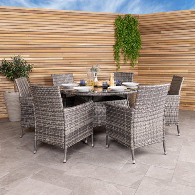 Jeneva 6 - Person Wicker Patio Dining Set with Round Table , Cushions Included