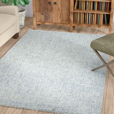 Tapis bleu clair / naturel en laine touffeté à la main Britley