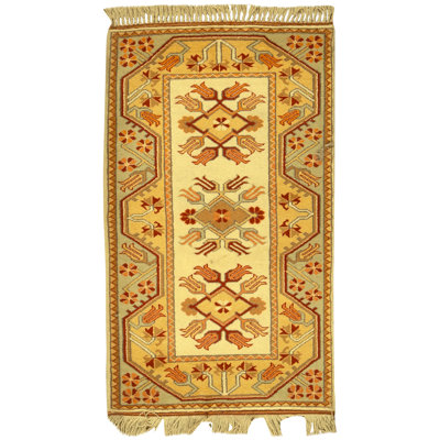 Tapis ivoire et doré de haute qualité noué à la main