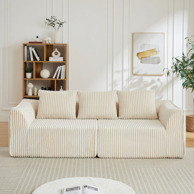 Minimalist 3-seater corduroy sofa featuring curved lines and a gently sloped backrest, comes complete with three throw pillows,Horn-Shaped Throw Pillo