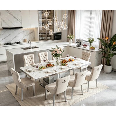 Ensemble de salle à manger extensible 9 pièces en faux marbre (63" à 95") avec 8 chaises rembourrées et grande table de cuisine extensible à piètement argenté miroir.