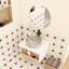 Meuble-lavabo flottant avec lavabo vasque en marbre veiné, meuble-lavabo mural avec tablette ouverte, avec décor en bois-130549805