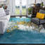 Tapis bleu / doré à motif abstrait Jaxen-1771369246