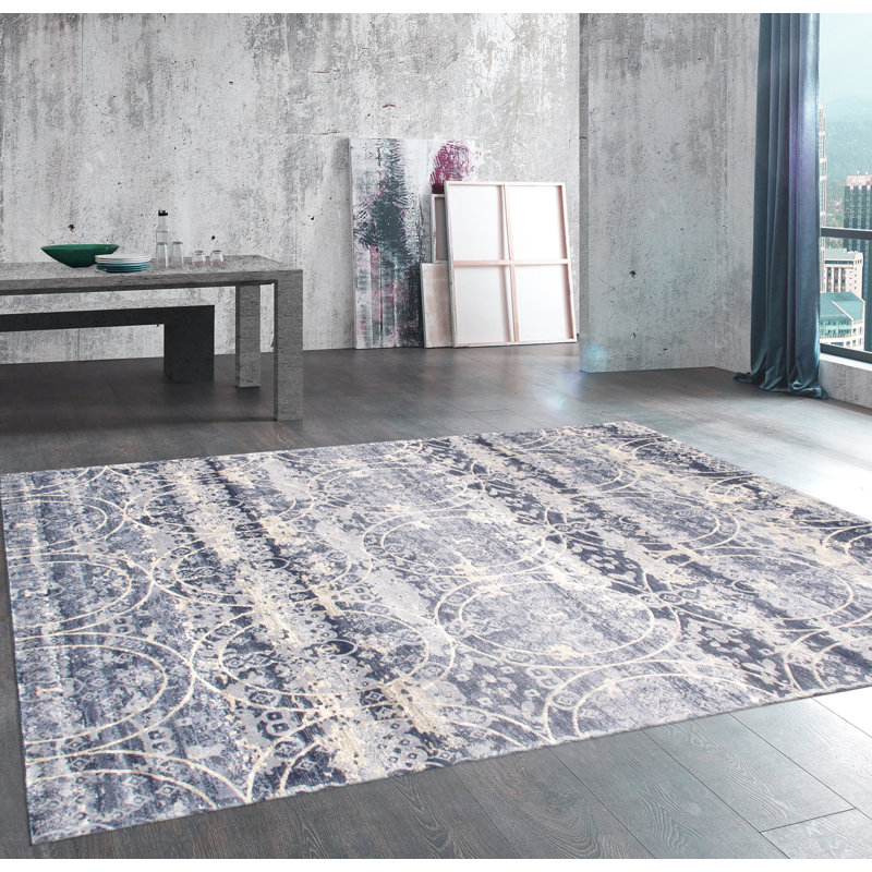 Blue and Beige Synthetic Geometric 5' x 7' Area Rug