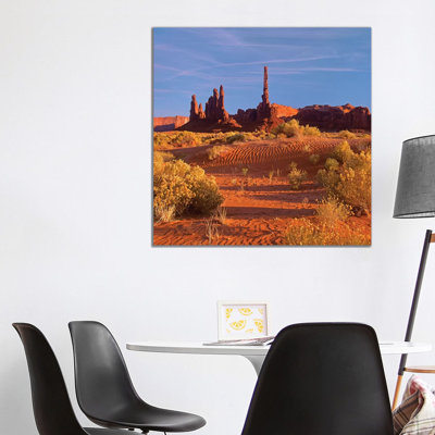 Totem Pole And Yei Bi Chei With Sand Dunes And Shrubs, Monument Valley, Arizona And Utah Border by Tim Fitzharris - Gallery-Wrapped Canvas Giclée on Canvas