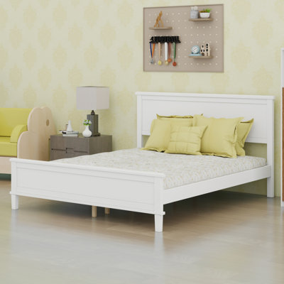 Lit plateforme moderne en bois avec tête de lit