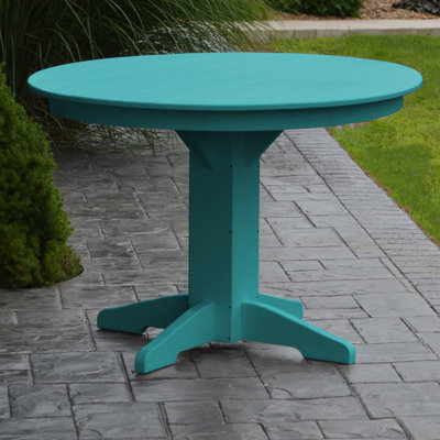 Nettie 4 - Person Patio Dining Set with Round Table