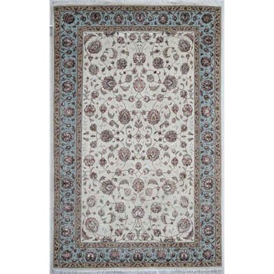 Tapis bleu marine et ivoire de haute qualité noué à la main