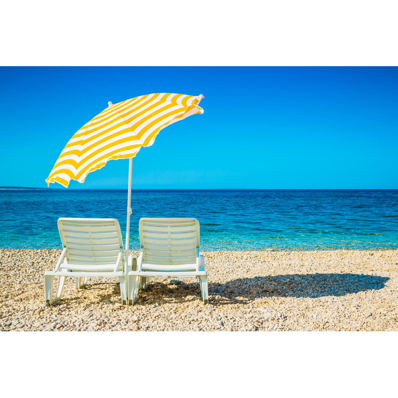 Lounge Chairs And Umbrella On Beach by Mbbirdy - No Frame Art Prints on Canvas, 61cm H x 91cm W