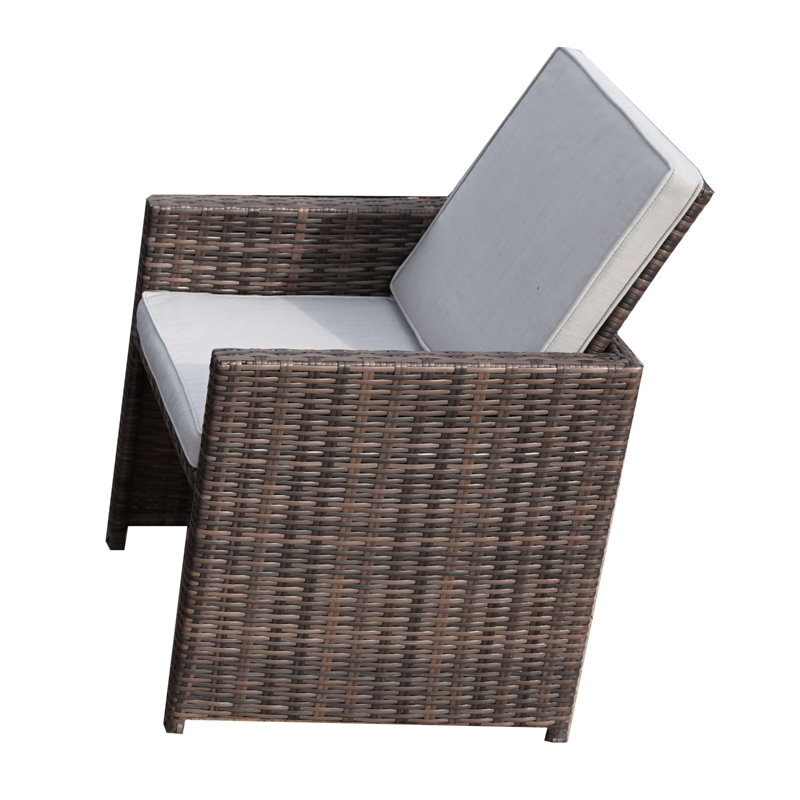 2 chaises de patio et 2 repose-pieds avec coussins Guynn