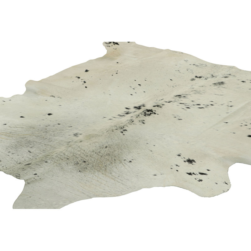 Rug & Kilim’S Extra Large Cowhide Rug In Black, White And Cream Tones