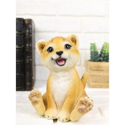 Figurine fantaisiste léopard avec un grand sourire