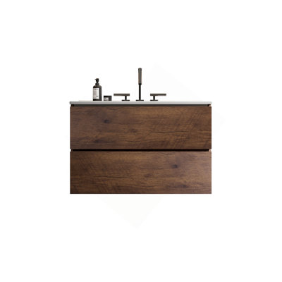 Meuble-lavabo mural avec lavabo en céramique et trois trous de robinet, offrant une élégance intemporelle et une fonctionnalité améliorée.
