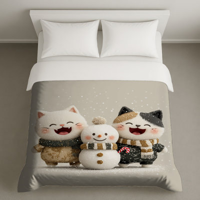 Jolis chats avec des housses de couette bonhomme de neige