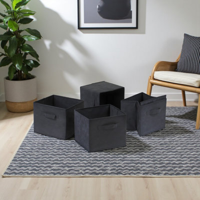 Set of four foldable fabric baskets by Ikard