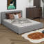 Grand lit tapissier avec base solide-386142556