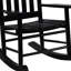 Chaise berçante noire avec dossier en lattes de bois