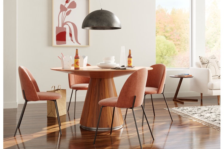 Open concept dining area with takeout food on the table.