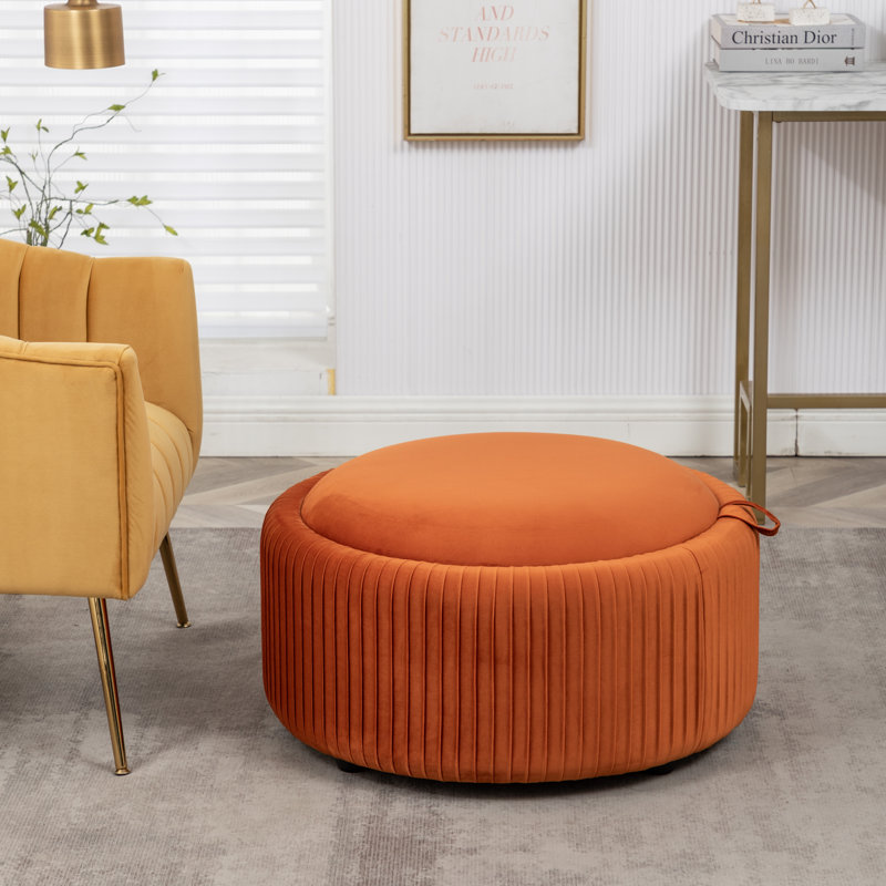 Savinien Upholstered Round Storage Ottoman, Orange Velvet