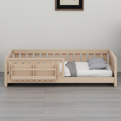 Low-Profile Sleeper with Protective Side Rail and Built-in Bookcase