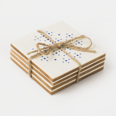 Ensemble de sous-verres en résine blanche et bleue Perfora
