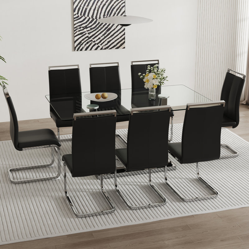 Ensemble de salle à manger contemporain en verre: plateau rectangulaire, structure en métal argenté, chaises en similicuir - design élégant pour les espaces modernes