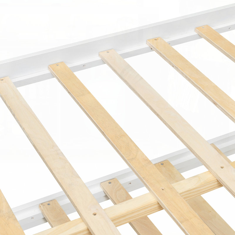 Lit de jour avec lit gigogne et tiroirs, conception peu encombrante pour les chambres d'amis, combinant rangement et confort dans un ensemble élégant