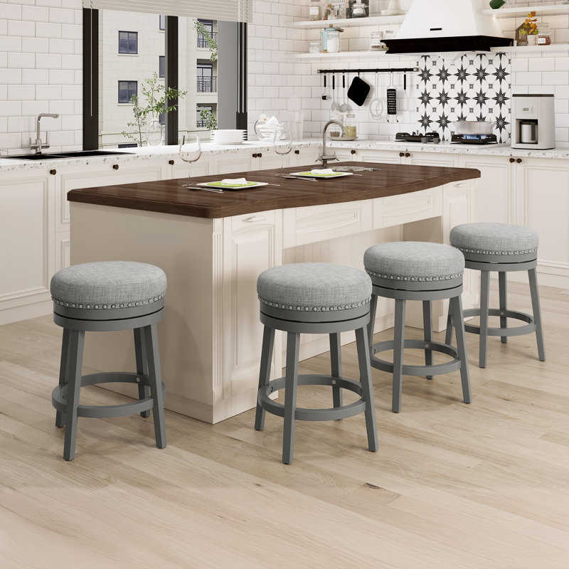 Tabouret de bar rembourré pivotant avec structure en bois massif et garniture cloutée, Gris