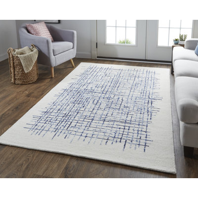 Tapis rectangulaire ivoire / bleu en laine touffeté à la main Rectangle Norvan