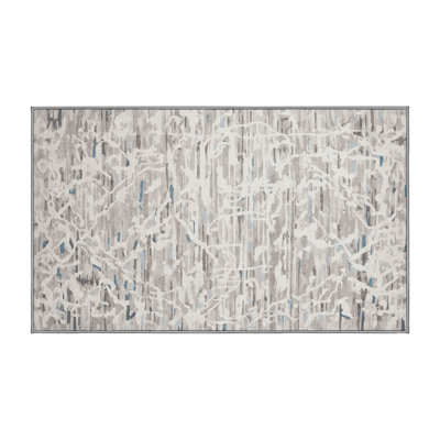Tapis gris lavable à la machine