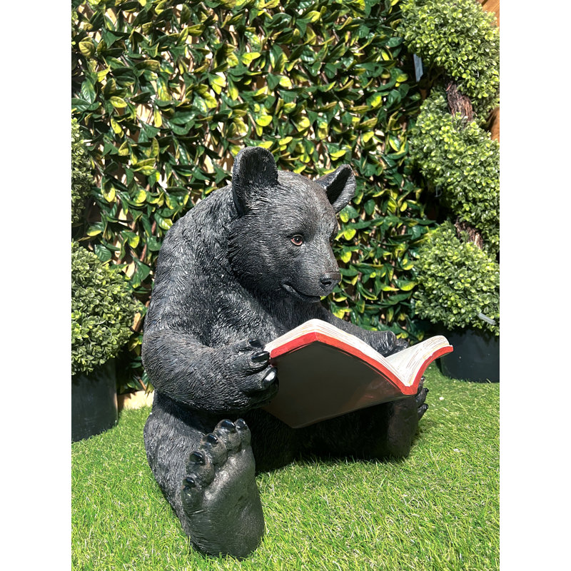 Ours lisant un livre