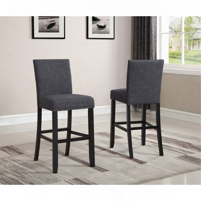 Ensemble de 2 tabourets de bar en tissu avec garniture cloutée Biony, gris