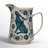 Stoneware Pitcher With Painted Rabbit And Florals