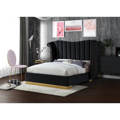 Cicero Upholstered Wingback Bed