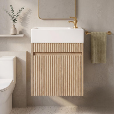 Meuble-lavabo suspendu en bois sans poignées de 47 cm (18,5 po) de largeur avec dessus réversible en SMC