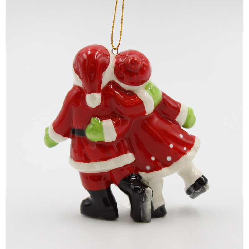 Ornement de patinage père Noël et madame Claus
