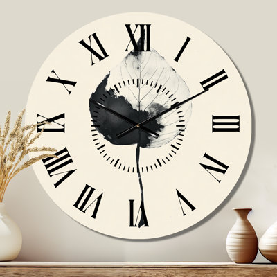 Horloge murale ronde en métal « Feuille en un seul coup de pinceau » - Motif botanique