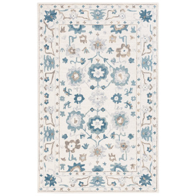 Tapis oriental ivoire / bleu en laine / coton touffeté à la main Malbora