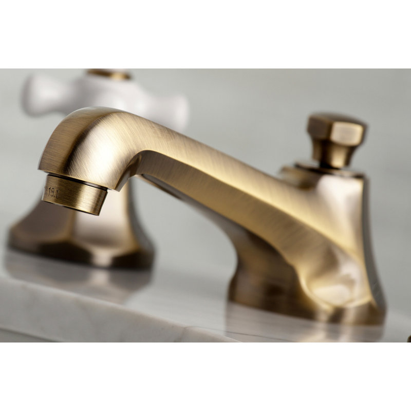 Kingston Brass Metropolitan Two-Handle 3-Hole Deck Mount Widespread Bathroom Faucet with Brass Pop-Up Drain, Antique Brass