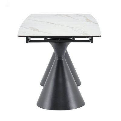 Extendable Stone-Top Dining Table: White marble-patterned tabletop with black tapered metal legs. A modern, luxury-inspired rectangular dining table f