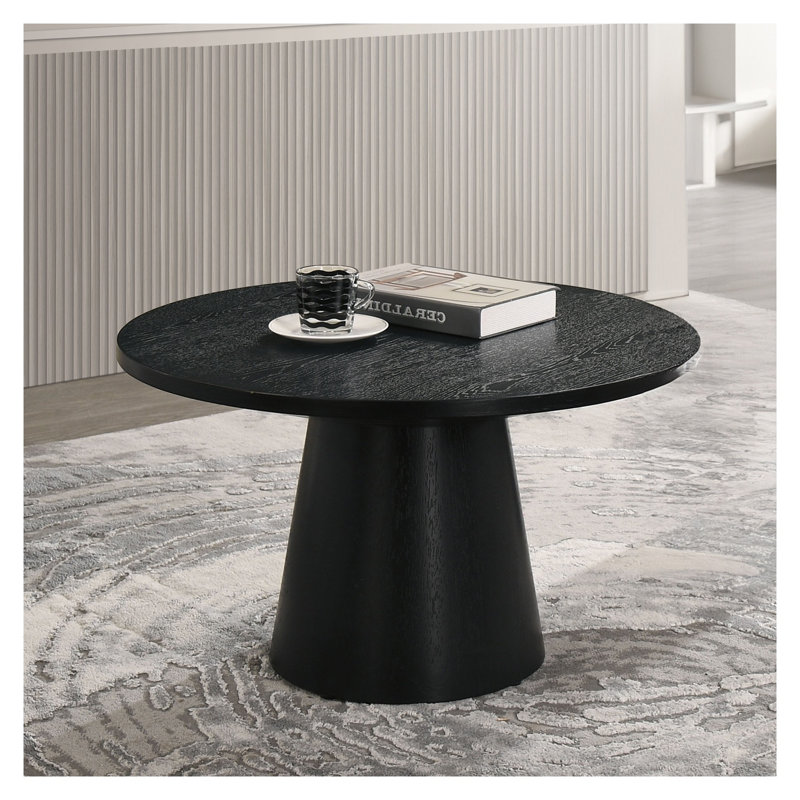 Table basse ronde moderne avec base en forme de cône en noir