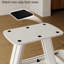 Table de salle à manger extensible blanche avec pieds élégants en forme de U pour une maison moderne
