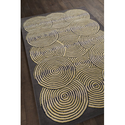 Tapis en laine à motif de cercles concentriques modernes gris, crème, jaune et noir Stella