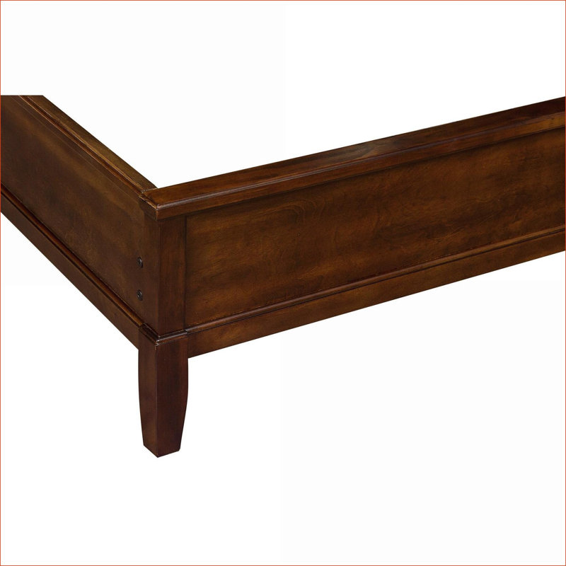 Grand lit-bateau de style transitionnel, tête de lit capitonnée en faux bois de merisier capitonné