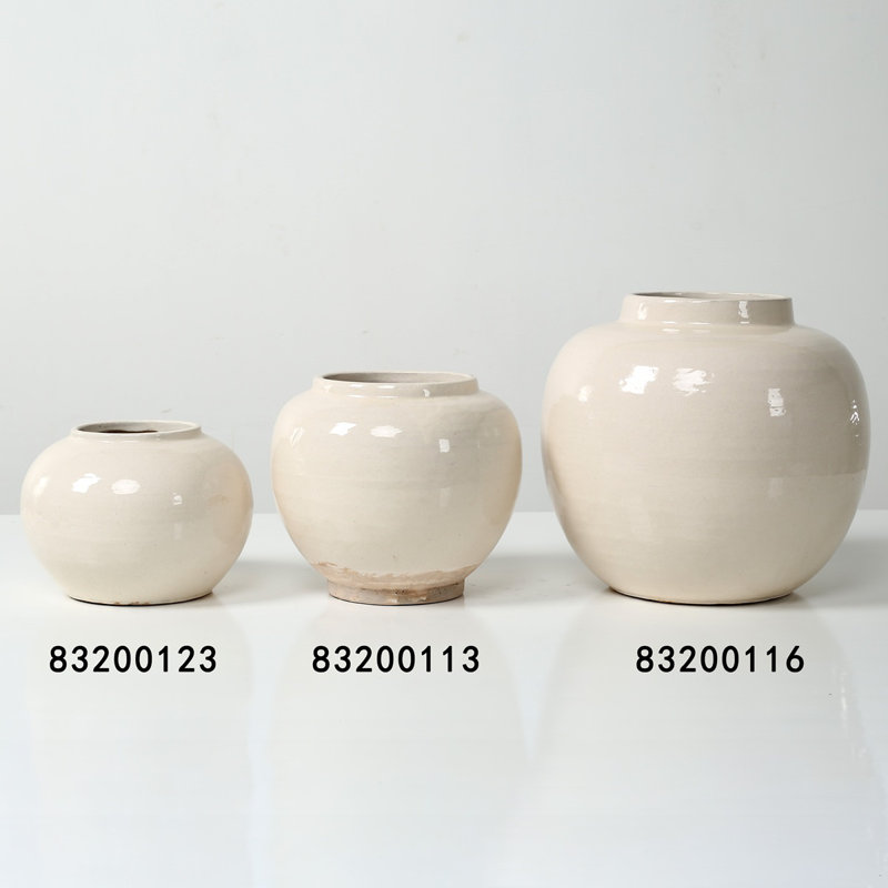 Approx. 8 Inches Off White Ceramic Round Jar