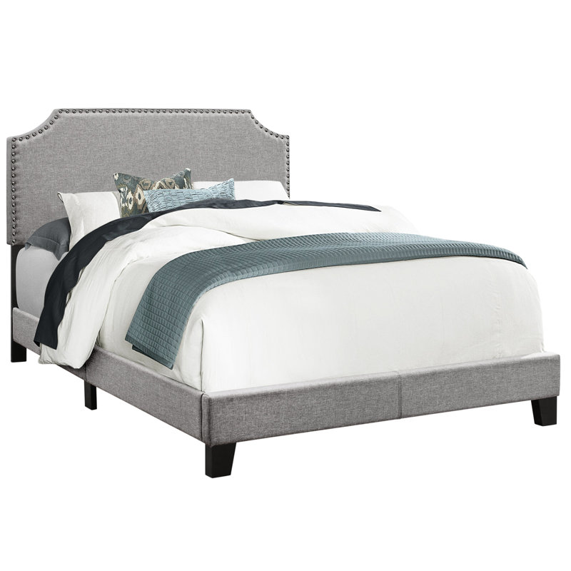 Lit double tapissier de style lin gris avec garniture pour tête de lit et classe décoratives